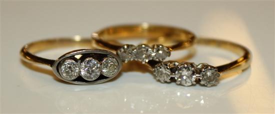 3 x 18ct gold and 3 stone diamond rings.